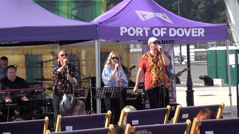 The Rubber Biscuit Band provide entertainment on the Marina Curve