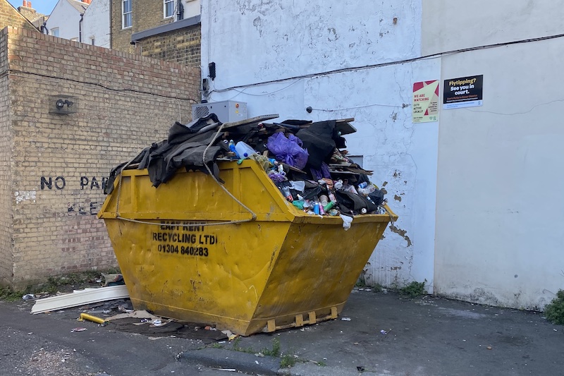 Skip full of rubbish en route to Roman Painted House